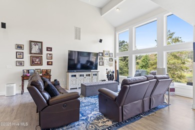 Welcome to your serene retreat in the sought-after beach town of on Oyster Bay Golf Links in North Carolina - for sale on GolfHomes.com, golf home, golf lot