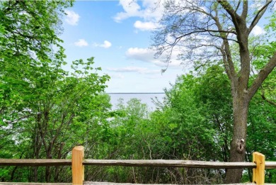 Welcome to your own slice of paradise on Lake Koshkonong! This on Koshkonong Mounds Country Club in Wisconsin - for sale on GolfHomes.com, golf home, golf lot