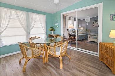 Adorable 2 bed, 2 bath home on a desirable corner lot in on Barefoot Bay Golf Course in Florida - for sale on GolfHomes.com, golf home, golf lot