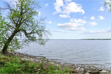 Welcome to your own slice of paradise on Lake Koshkonong! This on Koshkonong Mounds Country Club in Wisconsin - for sale on GolfHomes.com, golf home, golf lot
