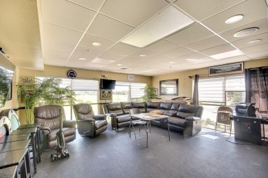 Enjoy stunning lake and golf course views from this lovely on Terra Ceia Golf and Country Club in Florida - for sale on GolfHomes.com, golf home, golf lot