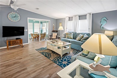 Adorable 2 bed, 2 bath home on a desirable corner lot in on Barefoot Bay Golf Course in Florida - for sale on GolfHomes.com, golf home, golf lot