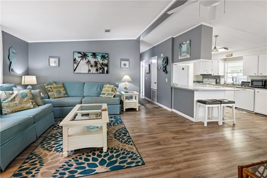 Adorable 2 bed, 2 bath home on a desirable corner lot in on Barefoot Bay Golf Course in Florida - for sale on GolfHomes.com, golf home, golf lot