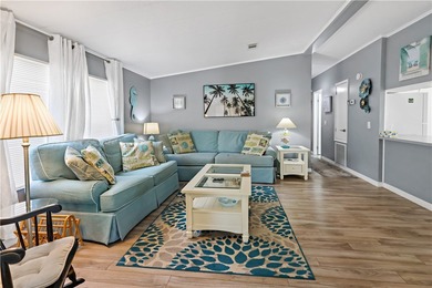 Adorable 2 bed, 2 bath home on a desirable corner lot in on Barefoot Bay Golf Course in Florida - for sale on GolfHomes.com, golf home, golf lot