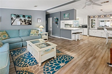 Adorable 2 bed, 2 bath home on a desirable corner lot in on Barefoot Bay Golf Course in Florida - for sale on GolfHomes.com, golf home, golf lot