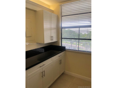 AMAZING VIEWS FROM THIS 2 BEDROOM 2 BATH WHITEHALL CONDO LOCATED on  in Florida - for sale on GolfHomes.com, golf home, golf lot