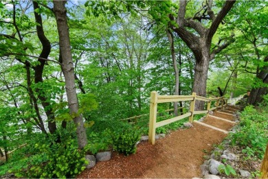 Welcome to your own slice of paradise on Lake Koshkonong! This on Koshkonong Mounds Country Club in Wisconsin - for sale on GolfHomes.com, golf home, golf lot