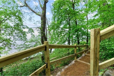 Welcome to your own slice of paradise on Lake Koshkonong! This on Koshkonong Mounds Country Club in Wisconsin - for sale on GolfHomes.com, golf home, golf lot