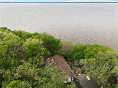 Welcome to your own slice of paradise on Lake Koshkonong! This on Koshkonong Mounds Country Club in Wisconsin - for sale on GolfHomes.com, golf home, golf lot