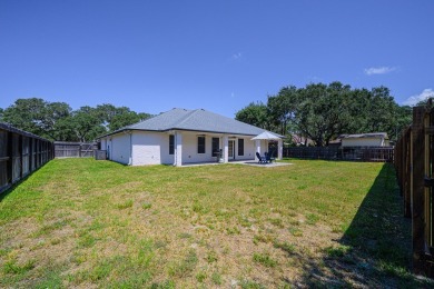 Experience the best of coastal living in this 4-bedroom, 2-bath on Rockport Country Club in Texas - for sale on GolfHomes.com, golf home, golf lot