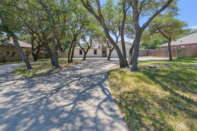 Experience the best of coastal living in this 4-bedroom, 2-bath on Rockport Country Club in Texas - for sale on GolfHomes.com, golf home, golf lot