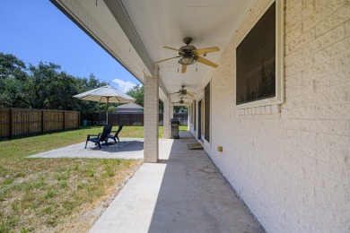 Experience the best of coastal living in this 4-bedroom, 2-bath on Rockport Country Club in Texas - for sale on GolfHomes.com, golf home, golf lot