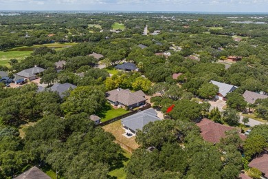 Experience the best of coastal living in this 4-bedroom, 2-bath on Rockport Country Club in Texas - for sale on GolfHomes.com, golf home, golf lot