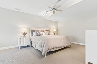 Welcome to your serene retreat in the sought-after beach town of on Oyster Bay Golf Links in North Carolina - for sale on GolfHomes.com, golf home, golf lot