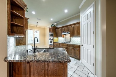 4 bedroom, 2.5 bath, 2 car garage w- golf cart stall! The on Eagles Bluff Golf Course in Texas - for sale on GolfHomes.com, golf home, golf lot