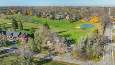 Experience resort-style living with serene, year-round views of on Forest Lake Country Club in Michigan - for sale on GolfHomes.com, golf home, golf lot