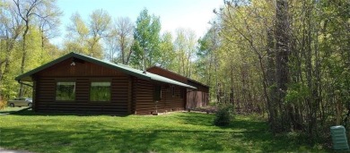 Charming Log Home (with 4 adjoining parcels for over 1 acre of on Hardwoods Golf Club At Mille Lacs in Minnesota - for sale on GolfHomes.com, golf home, golf lot