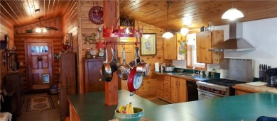 Charming Log Home (with 4 adjoining parcels for over 1 acre of on Hardwoods Golf Club At Mille Lacs in Minnesota - for sale on GolfHomes.com, golf home, golf lot