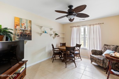 Step inside 7919 Trap Way and you're immediately welcomed into a on Masonboro Country Club in North Carolina - for sale on GolfHomes.com, golf home, golf lot
