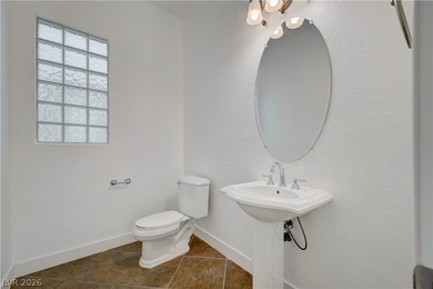 Inside the prestigious Tudor Park at Queensridge, a masterclass on Badlands Golf Club in Nevada - for sale on GolfHomes.com, golf home, golf lot