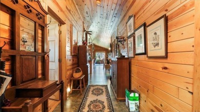 Charming Log Home (with 4 adjoining parcels for over 1 acre of on Hardwoods Golf Club At Mille Lacs in Minnesota - for sale on GolfHomes.com, golf home, golf lot