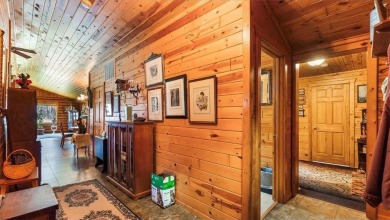 Charming Log Home (with 4 adjoining parcels for over 1 acre of on Hardwoods Golf Club At Mille Lacs in Minnesota - for sale on GolfHomes.com, golf home, golf lot