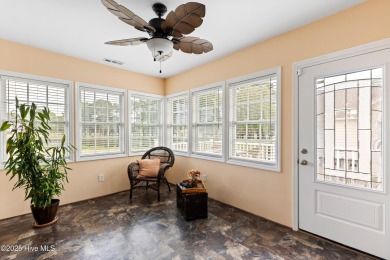 Step inside 7919 Trap Way and you're immediately welcomed into a on Masonboro Country Club in North Carolina - for sale on GolfHomes.com, golf home, golf lot