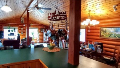 Charming Log Home (with 4 adjoining parcels for over 1 acre of on Hardwoods Golf Club At Mille Lacs in Minnesota - for sale on GolfHomes.com, golf home, golf lot