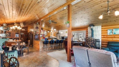 Charming Log Home (with 4 adjoining parcels for over 1 acre of on Hardwoods Golf Club At Mille Lacs in Minnesota - for sale on GolfHomes.com, golf home, golf lot