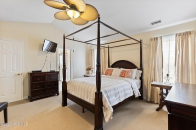 Step inside 7919 Trap Way and you're immediately welcomed into a on Masonboro Country Club in North Carolina - for sale on GolfHomes.com, golf home, golf lot