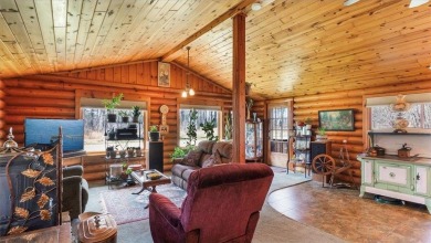 Charming Log Home (with 4 adjoining parcels for over 1 acre of on Hardwoods Golf Club At Mille Lacs in Minnesota - for sale on GolfHomes.com, golf home, golf lot