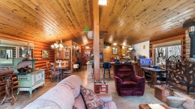 Charming Log Home (with 4 adjoining parcels for over 1 acre of on Hardwoods Golf Club At Mille Lacs in Minnesota - for sale on GolfHomes.com, golf home, golf lot