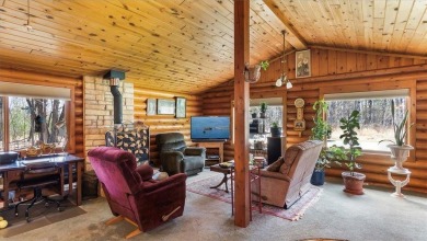 Charming Log Home (with 4 adjoining parcels for over 1 acre of on Hardwoods Golf Club At Mille Lacs in Minnesota - for sale on GolfHomes.com, golf home, golf lot