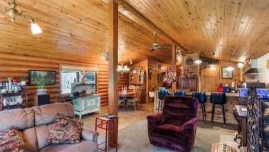 Charming Log Home (with 4 adjoining parcels for over 1 acre of on Hardwoods Golf Club At Mille Lacs in Minnesota - for sale on GolfHomes.com, golf home, golf lot