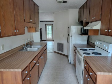 Great location very near the Wildwood Golf Couse just off Hwy 98 on Wildwood Country Club in Florida - for sale on GolfHomes.com, golf home, golf lot