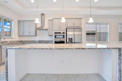 One or more photo(s) has been virtually staged. Built in 2023 on Eagle Creek Golf Club in Florida - for sale on GolfHomes.com, golf home, golf lot