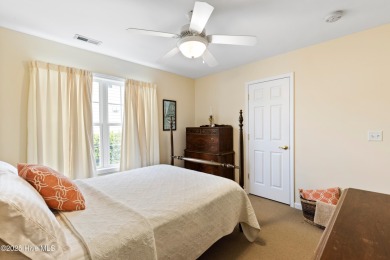 Step inside 7919 Trap Way and you're immediately welcomed into a on Masonboro Country Club in North Carolina - for sale on GolfHomes.com, golf home, golf lot