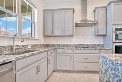 One or more photo(s) has been virtually staged. Built in 2023 on Eagle Creek Golf Club in Florida - for sale on GolfHomes.com, golf home, golf lot