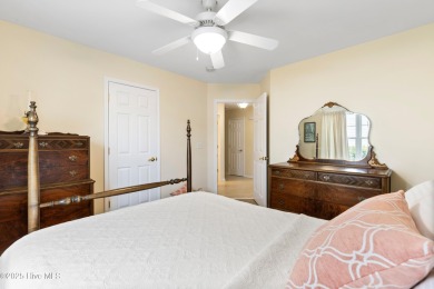 Step inside 7919 Trap Way and you're immediately welcomed into a on Masonboro Country Club in North Carolina - for sale on GolfHomes.com, golf home, golf lot