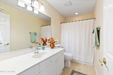 Step inside 7919 Trap Way and you're immediately welcomed into a on Masonboro Country Club in North Carolina - for sale on GolfHomes.com, golf home, golf lot