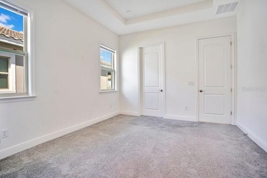 One or more photo(s) has been virtually staged. Built in 2023 on Eagle Creek Golf Club in Florida - for sale on GolfHomes.com, golf home, golf lot