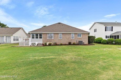Step inside 7919 Trap Way and you're immediately welcomed into a on Masonboro Country Club in North Carolina - for sale on GolfHomes.com, golf home, golf lot