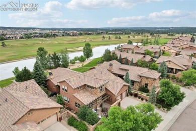 Experience unparalleled luxury and tranquility backing to a on The Club At Flying Horse in Colorado - for sale on GolfHomes.com, golf home, golf lot