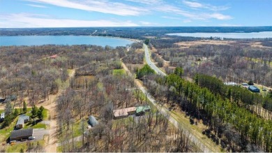 Charming Log Home (with 4 adjoining parcels for over 1 acre of on Hardwoods Golf Club At Mille Lacs in Minnesota - for sale on GolfHomes.com, golf home, golf lot