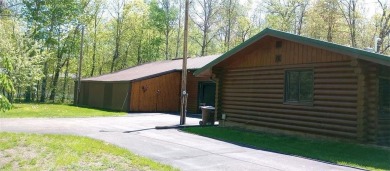 Charming Log Home (with 4 adjoining parcels for over 1 acre of on Hardwoods Golf Club At Mille Lacs in Minnesota - for sale on GolfHomes.com, golf home, golf lot