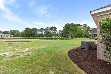 Step inside 7919 Trap Way and you're immediately welcomed into a on Masonboro Country Club in North Carolina - for sale on GolfHomes.com, golf home, golf lot
