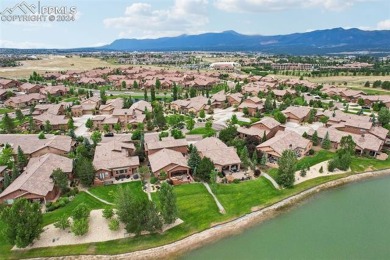 Experience unparalleled luxury and tranquility backing to a on The Club At Flying Horse in Colorado - for sale on GolfHomes.com, golf home, golf lot