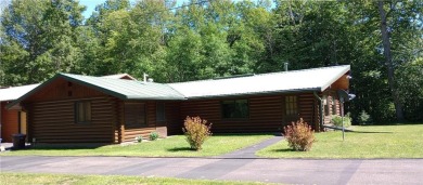 Charming Log Home (with 4 adjoining parcels for over 1 acre of on Hardwoods Golf Club At Mille Lacs in Minnesota - for sale on GolfHomes.com, golf home, golf lot