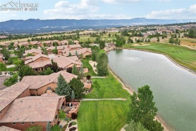 Experience unparalleled luxury and tranquility backing to a on The Club At Flying Horse in Colorado - for sale on GolfHomes.com, golf home, golf lot