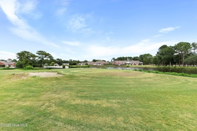 Step inside 7919 Trap Way and you're immediately welcomed into a on Masonboro Country Club in North Carolina - for sale on GolfHomes.com, golf home, golf lot
